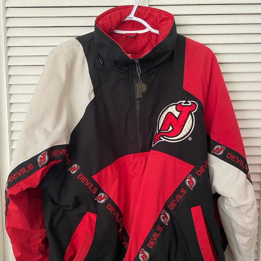 The devils Vintage original wind breaker, small but runs oversized